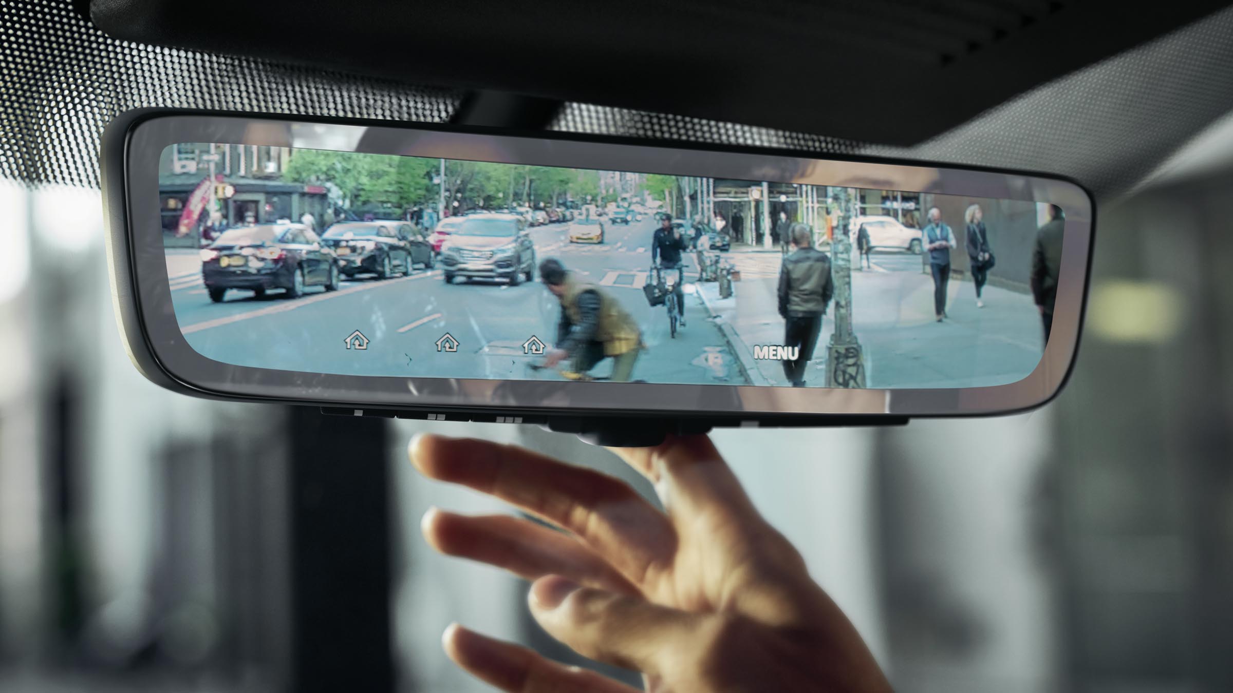 Close-up of 2022 INFINITI QX80 SUV rearview mirror.